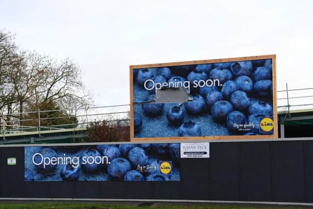 'Opening soon' signs at the site