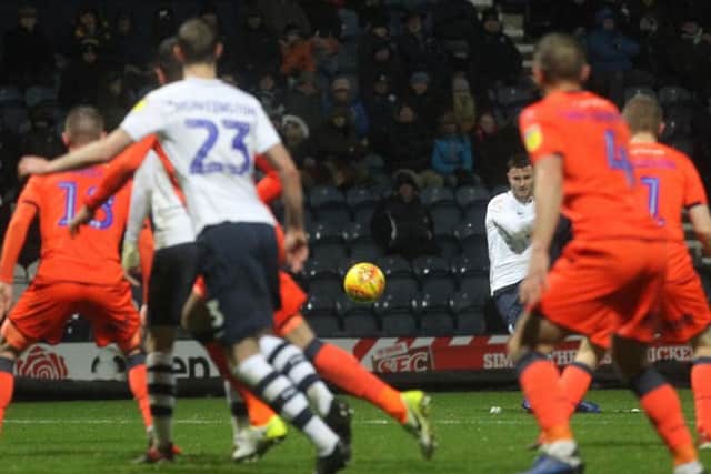 Andrew Hughes scores Preston's crucial third goal in their win over Millwall