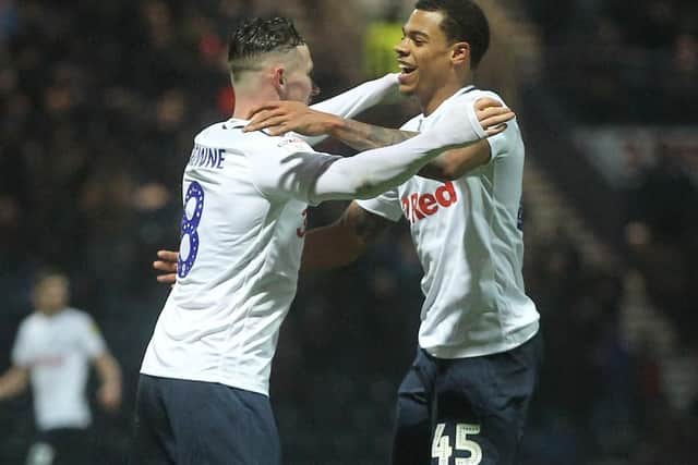 Lukas Nmecha congratulates Browne on his goal at Deepdale on Saturday