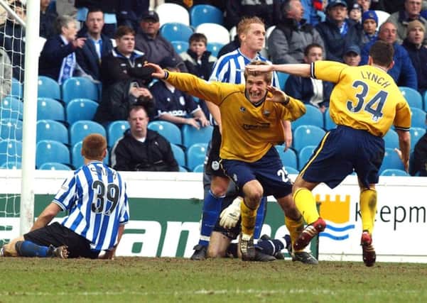 Richard Cresswell spins away in delight after getting the only goal of the game at Hillsborough