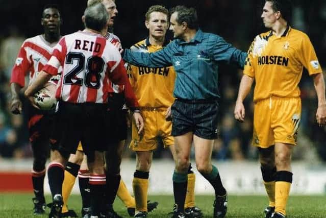 Dave Allison in November 1993 trying to maintain order in the Southampton v Tottenham Hotspur game at the Dell.