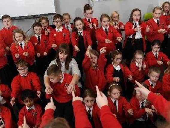 St Gregory's primary school sign language choir perform a Christmas concert at Integrate