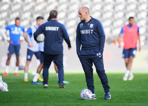Preston North End manager Alex Neil will be hard at work with his players on Christmas Day
