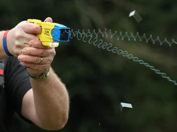 Lancashire Police officers  drew tasers  303 times between April 2017 and March 2018