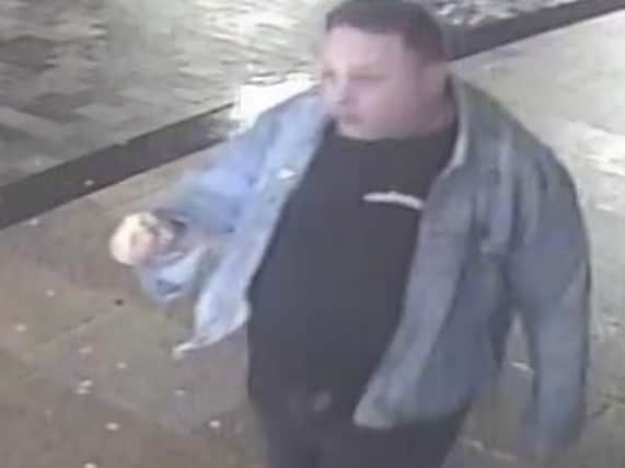 Police want to speak to this man after a man was found unconscious outside the Dog Inn, Church Street, Preston on Thursday December 20.