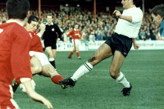 This Boxing Day clash is famous for PNE turning up without their shirts and having to borrow some from Crewe. Ian Bogie is pictured scoring for North End