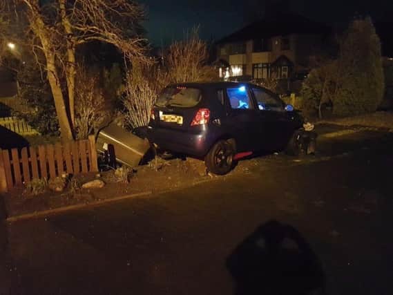 Car crashes into a gatepost in the front garden of a house on Hoghton Lane.