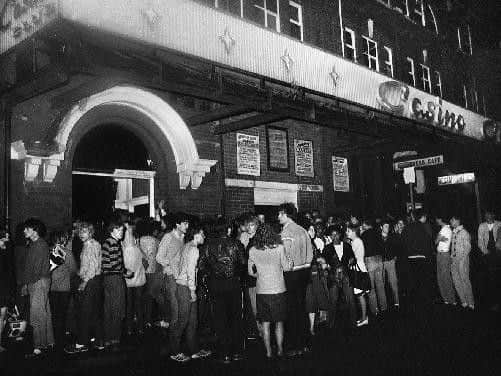 Revellers queing outside the famous Empress Ballroom, better known as the Wigan Casino