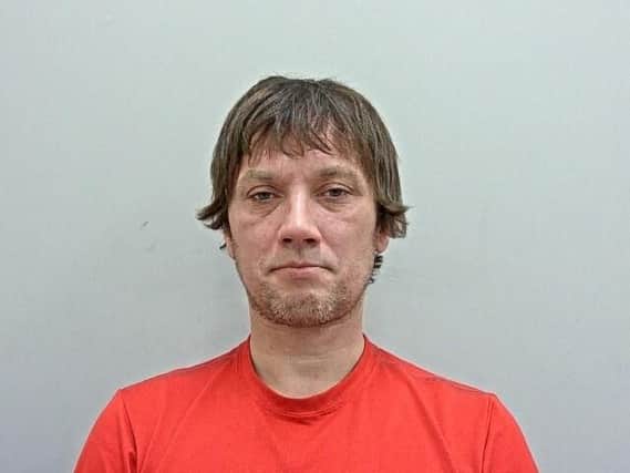 Warren Givens, 44, is wanted following the stabbing of a 37-year-old man in Preston  on Christmas Day.