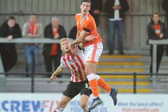 Jayden Stockley in action for Exeter against Blackpool in the FA Cup in November