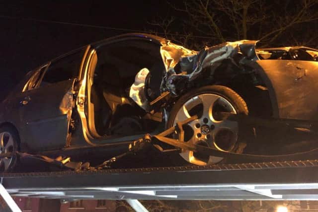 Both cars were badly damaged in the crash on Lydiate Lane