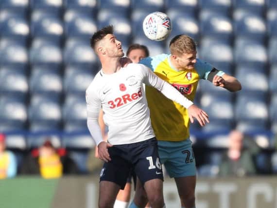 Michael Smith battles with Andrew Hughes during PNE's 1-1 draw with Rotherham at Deepdale earlier in the season
