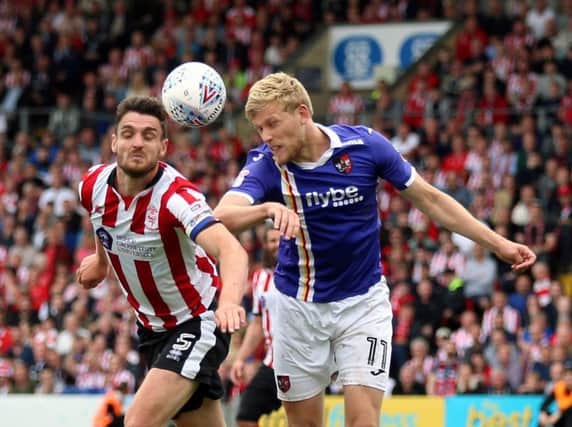 Exeter City striker Jayden Stockley (right) is a target for Preston