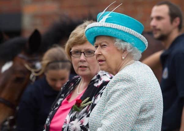 Ann Turner with HM The Queen in 2015