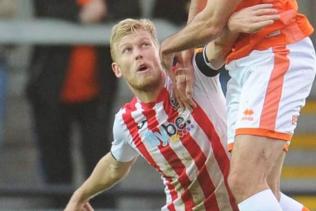 Jayden Stockley in action for Exeter