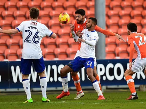 Mansfield Town winger CJ Hamilton in action for Mansfield against Blackpool