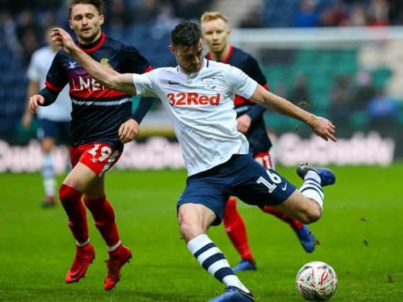 Preston left-back Andrew Hughes on the ball against Doncaster