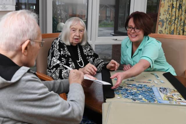 Victoria Gaile with residents Veronica and Harry