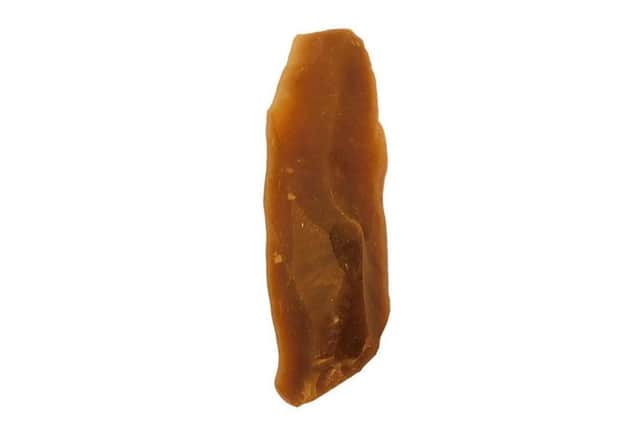 Neolithic flint tool found during an archeological dig on the Cuerden Strategic Site. Copyright: Universiry of Salford.
