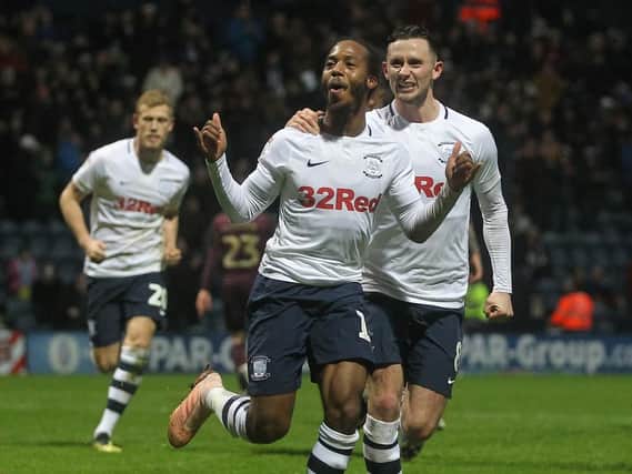 Daniel Johnson and Alan Browne celebrate Preston's goal against Swansea