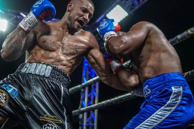Damian Chambers on his way to victory over Elvis Dube. Picture: Chris Roberts for MTK Global