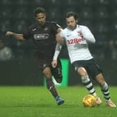 Ben Pearson battles with Wayne Routledge during PNE's 1-1 draw with Swansea