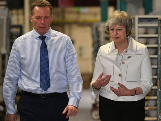 Theresa May this week during a factory visit on the even of the Brexit vote