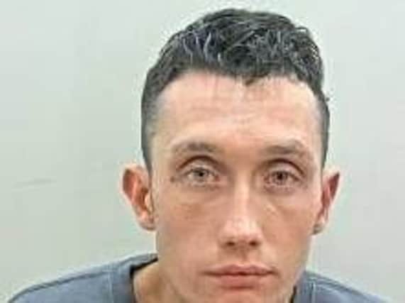 James Lowry, 29, is wanted in connection with an assault and theft which took place in Preston on December 30.