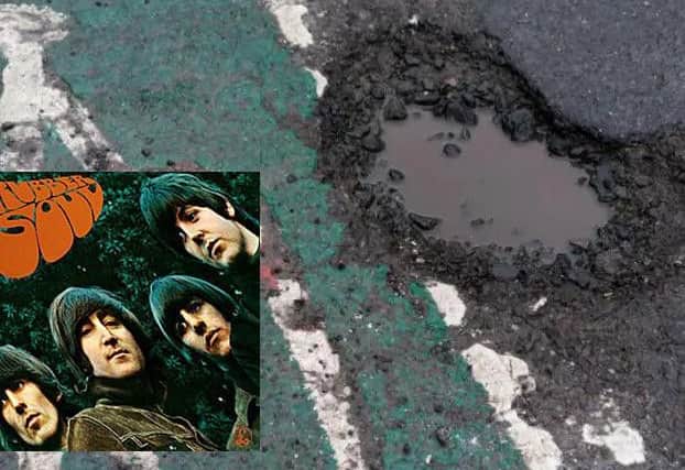 The pothole and the album cover of Rubber Soul