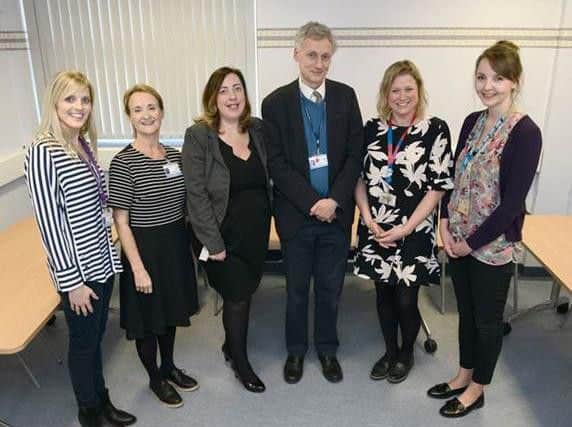 The tracheostomy team at the Royal Preston (l-r):  Lisa Hayward - specialist physiotherapist; Lee Hughes - specialist speech and language therapist; Sandra Davey - clinical business manager; Dr. David Shakespeare - consultant in neuro rehabilitation; Rachael Moses - consultant physiotherapist; Emma Forster - clinical specialist practitioner