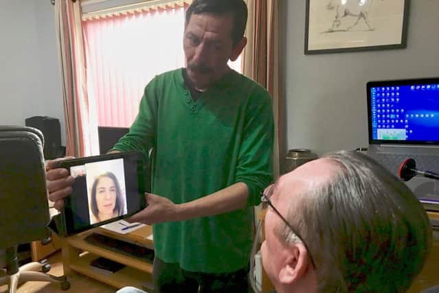 Former tracheostomy patient Ian Wardle receiving speech therapy from the Royal Preston via the internet.
