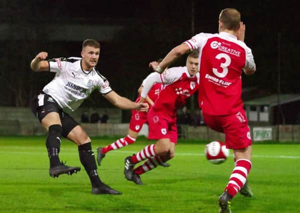 Brad Carsley in action for Bamber Bridge earlier in the season against Colne. PHOTO: Ruth Hornby