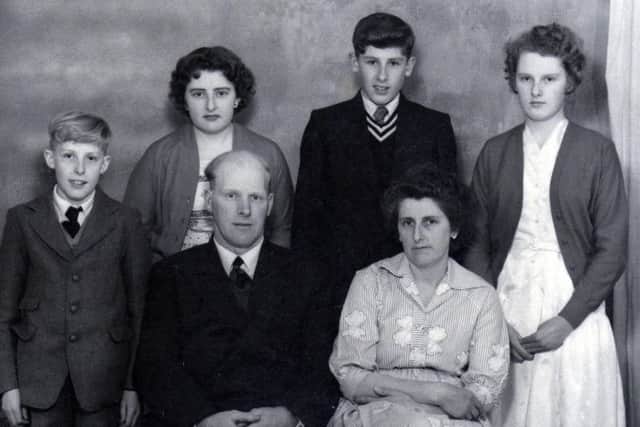Anne pictured far right, with her siblings and parents