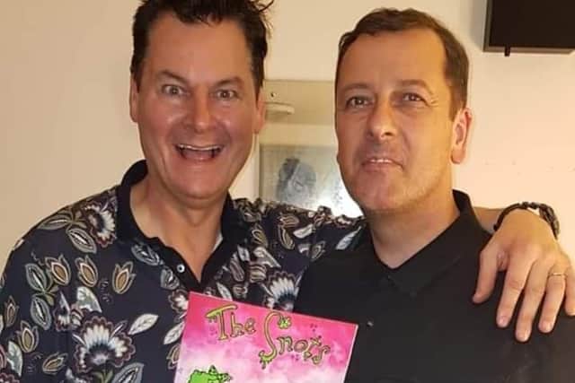 Phil and Tim with the new book