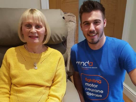 Vicky Round, who has MND, with family friend Sam Anderson, who has run every day for one year for MND Association