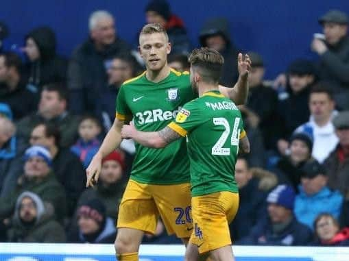 Preston striker Jayden Stockley is congratulated by Sean Maguire after scoring against QPR