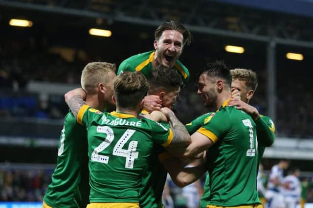 Jordan Storey is congratulated after scoring Preston North End's second goal against Queens Park Rangers