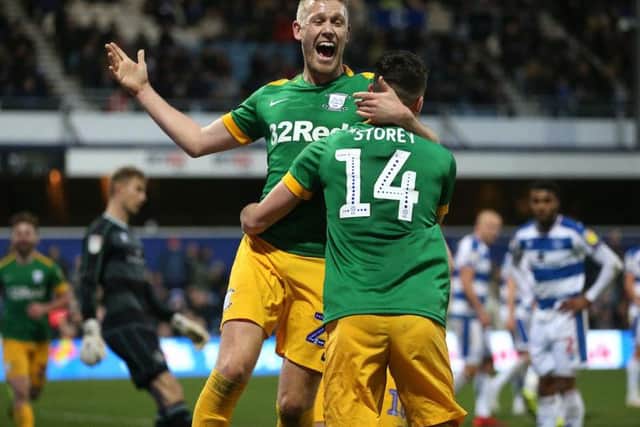 Jayden Stockley congratulates Jordan Storey on his first PNE goal, North End's second at Loftus Road on Saturday.