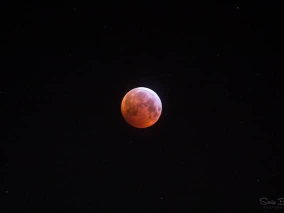 The moon glowing red during this morning's eclipse. Pic: Sonia Bashir