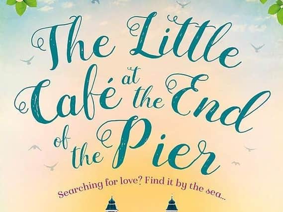 The Little Caf at the End of the Pier by Helen Rolfe