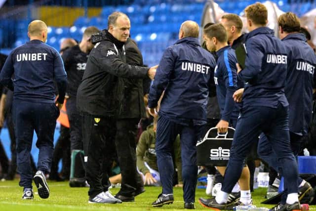 Marcelo Bielsa with the PNE coaching staff after the game at Elland Road