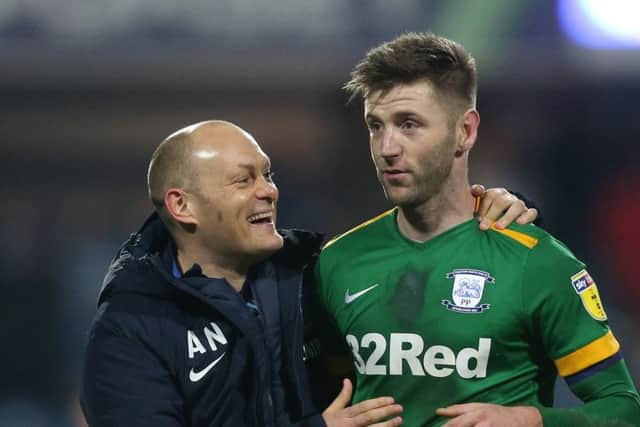 Preston North End manager Alex Neil celebrates with Paul Gallagher at the end of the 4-1 win over QPR