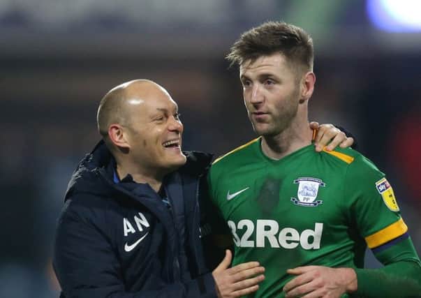 Preston North End manager Alex Neil celebrates with Paul Gallagher at the end of the 4-1 win over QPR