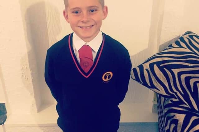 Leo in his school uniform