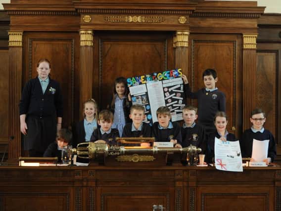 Pupils from Lea St Mary's Primary addressing Preston council about its plans to scrap plastic use.
