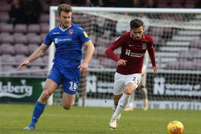 Rhys Oates (above, left) in action as Morecambe drew at Northampton Town last time out (photo: Getty Images)