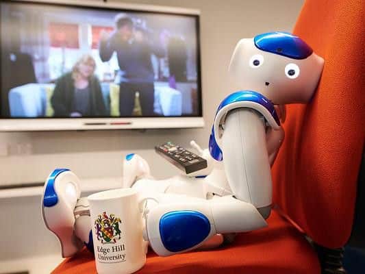 Robbie the Robot watching Emmerdale