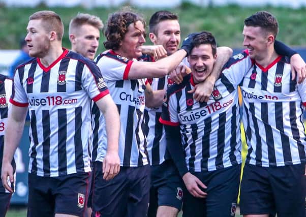 Players celebrate after Blakeman (second from right) scores Chorley's second against Guiseley (photo: Stefan Willoughby)