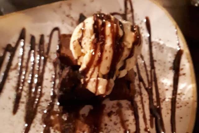 Homemade Rich Belgian Chocolate Brownie served with vanilla ice cream