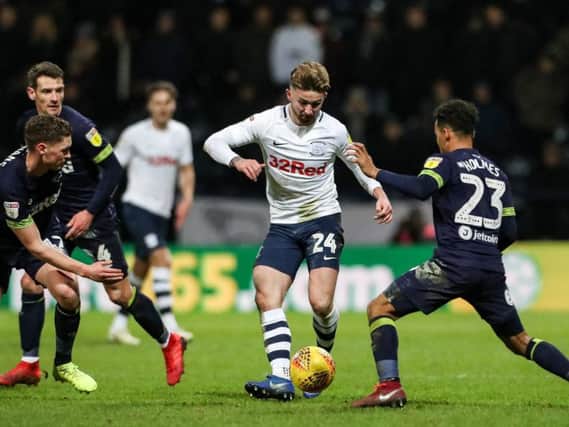 Sean Maguire takes on Duane Holmes in Preston's goalless draw with Derby